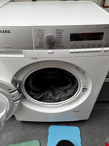 Wasmachine met rubber los
AEG L76475FL